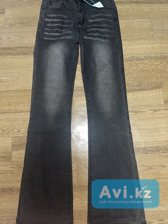 Женские джинсы клеш на низкой посадке Алматы - изображение 1