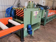 Многопильная линия для раскроя с центрирующим столом и выгрузкой досок Алматы