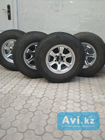 Продам зимние шины Bridgestone Blizzak Dmv1- 265/70r16 с дисками Алматы - изображение 1