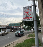 Реклама на фонарный столб освещения или придорожную опору Алматы Алматы