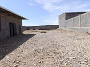 Сдается в аренду под склад участок с помещением (14×6 м) в Шымкенте, мкр. Бозарык Шымкент