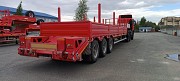 Полуприцеп тяжеловоз Политранс 94163 Другой город России