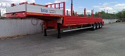 Полуприцеп-тяжеловоз Политранс 94163 Другой город России