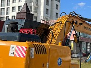 Аренда экскаватор колесный с гидромолотом Астана