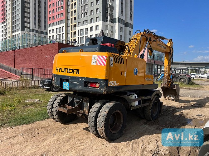 Аренда экскаватор колесный с гидромолотом Астана - изображение 1