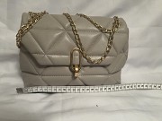 Продам оптом перчатки и женские сумочки Жезказган