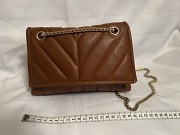 Продам оптом перчатки и женские сумочки Жезказган